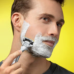 Man shaving with Wilkinson Sword's Hydro 5 Ultimate Men's Razor