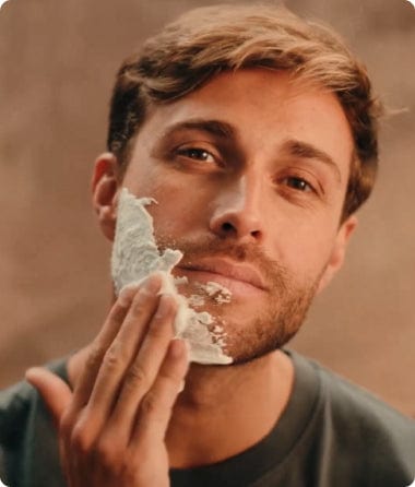 Man applying Wilkinson Sword shave cream